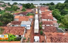 Cidade de Tocantinópolis com as barreiras de fiscalização da Taxa de Manutenção Viária sendo removidas após decisão judicial.